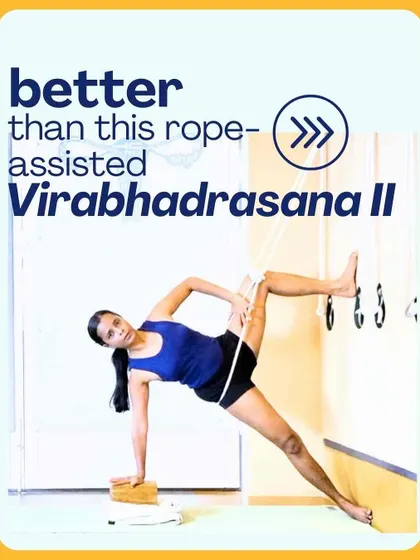 This image asks if there is a better way than the rope-assisted Virabhadrasana II. It prompts the student to think about progression and how props can be a stepping stone towards the final, unassisted expression of a pose.