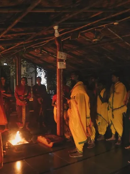 Students gather around the sacred fire for evening prayers. This communal ritual reinforces the spiritual bonds within the group and our connection to the ancient traditions we uphold.