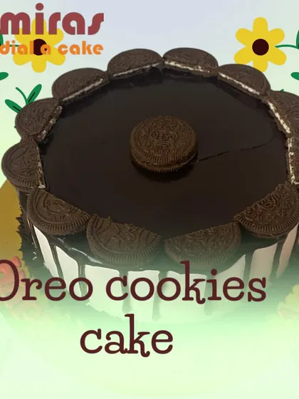 An irresistible Oreo cookies cake. This design is loaded with the classic cookie, featuring a chocolate drip and a border of Oreos for a treat that's all about that cookies-and-cream flavor.