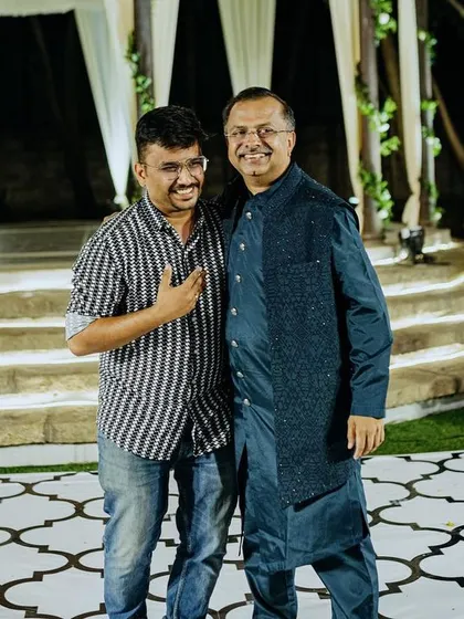 A moment of appreciation as the groom's father thanks our director on stage for a memorable evening. Building this trust and delivering beyond expectations is my promise.