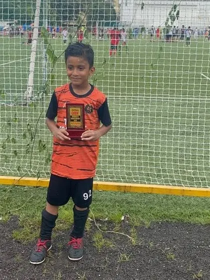 A young player recognized for his outstanding performance at the Mumbai 7s Championship Cup.