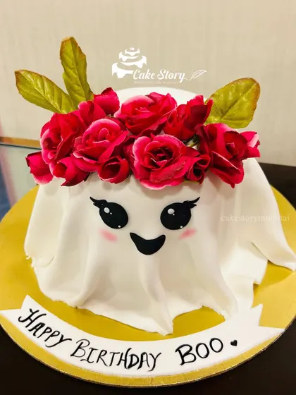 The cutest ghost you'll ever see! This 'Happy Birthday Boo' cake features an adorable ghost with a crown of red roses.