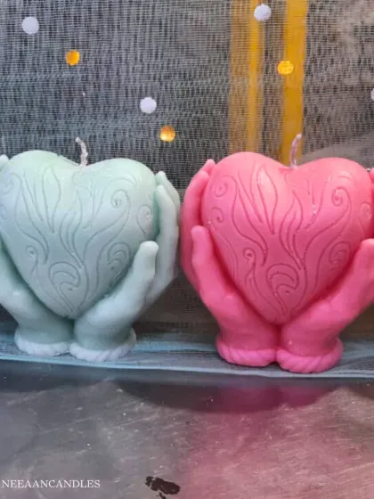 Holding a little light, a little love. I designed these "heart in hand" candles to be a reminder of warmth and care. They make such a thoughtful and beautiful gift.