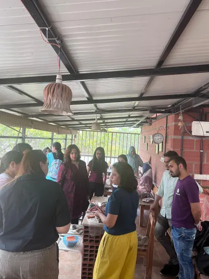 More moments from our corporate workshops. I love seeing colleagues encourage each other and discover their hidden artistic talents during these team activities.