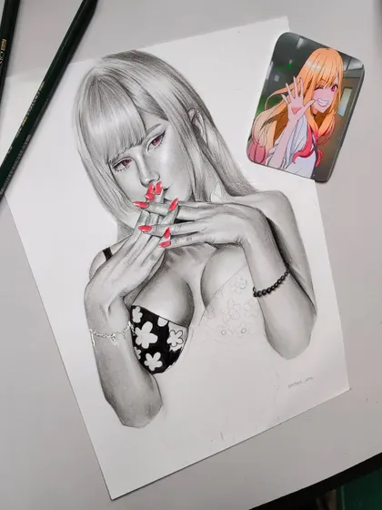 A work-in-progress shot of the Kitagawa piece. Here you can see the reference image next to my drawing as I add the final details.