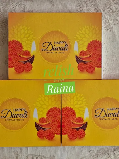 My vibrant yellow "Happy Diwali" gift box sleeves. The festive packaging adds a special touch to your gifts.