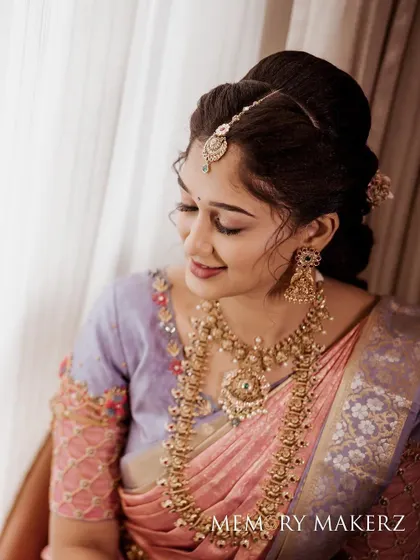 A close-up of Surabhi's engagement look, showing the detail of her makeup and jewelry.