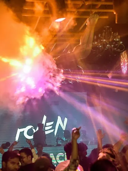 An explosion of pyrotechnics and smoke at Mikachi Club, Pune. These effects are timed perfectly with the music to create a high-impact, sensory experience for the audience.