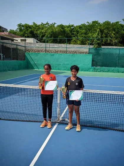A wide shot of the doubles finalists at the NS U-12 Hyderabad, showcasing the tournament setting.