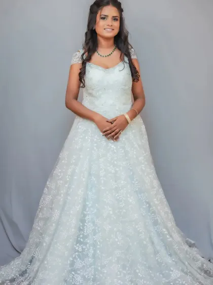 A white Christian wedding gown available for rent. A simple yet elegant choice for your special day.