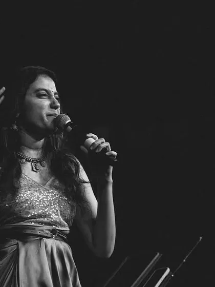 A black and white candid from my recent show. I love how these photos capture the raw emotion of a live performance.