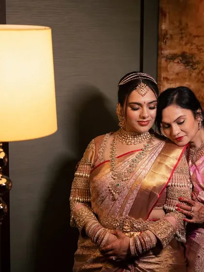 A touching moment between the bride and her mother, capturing the deep emotional connection and love.