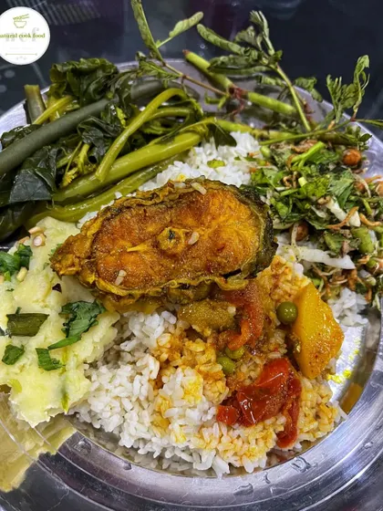 My personal platter with simple mashed potatoes, singju, a piece of fried fish curry, and steamed vegetables.
