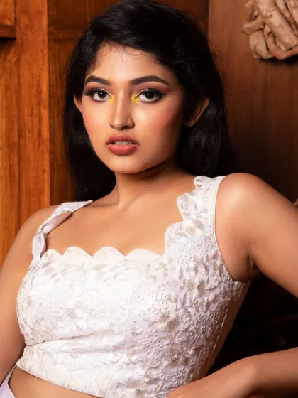 A close-up beauty shot of actress Rachana Inder. The focus here is on the striking makeup and her intense gaze, perfect for a beauty portfolio.