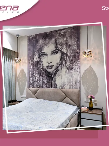 For an artistic touch, this bedroom features a large-scale portrait wallpaper behind the bed, creating a dramatic and personal focal point.