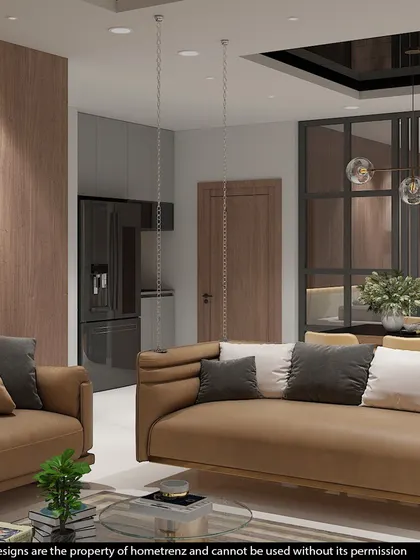 A large, open-plan dining and living area. The design uses a consistent color palette and materials to create a sense of flow and spaciousness.
