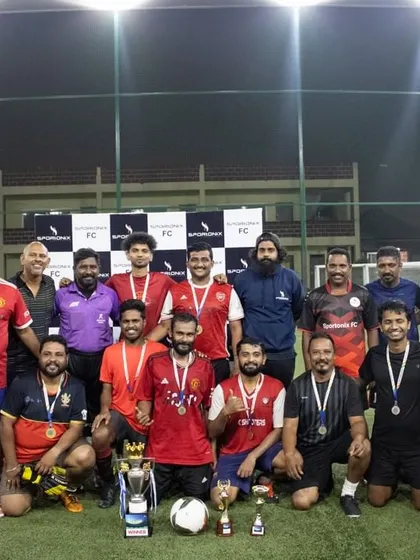 A final group shot of the winners and runners-up from the corporate football tournament, a perfect end to a great day of sport.