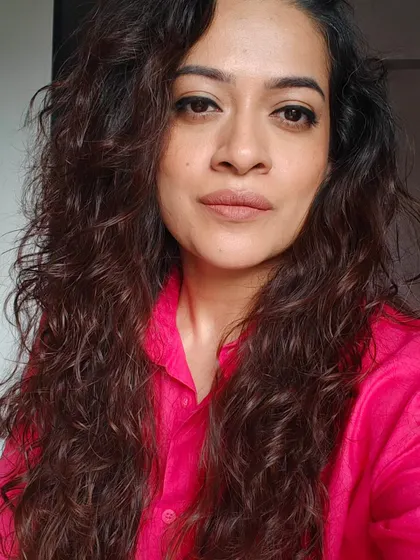 Playing with color. Here, I paired my usual soft glam makeup with a bright pink shirt to show how your outfit can change the entire vibe of your look.