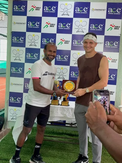 Presenting an award to a deserving player at the Ahmedabad tournament. It's rewarding to see players recognized for their hard work.