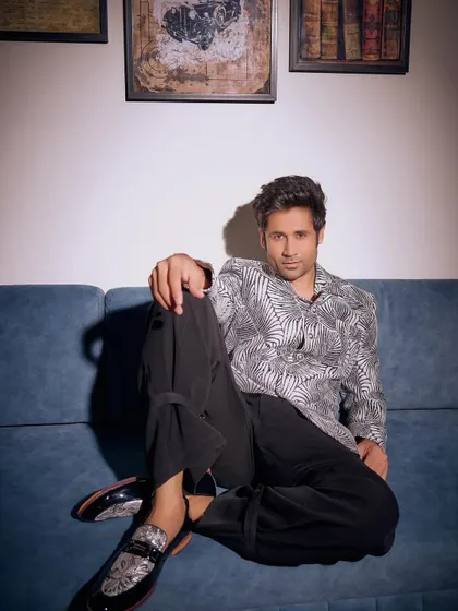 Whether it’s a festive function or a late-night party, this leaf-print blazer and trouser set from the Sukoon collection moves with you stylishly and unapologetically.