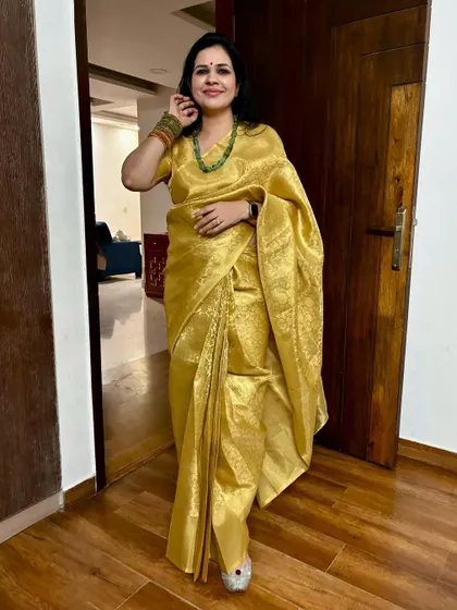 This golden tissue saree from Shree Meenakshi is another one of my top picks from a homegrown brand. The shine and texture are just perfect for a festive occasion.