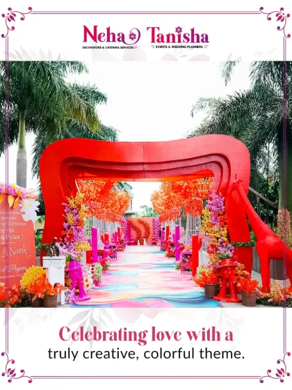 Step into a world of color and joy. We specialize in executing creative themes with flair, as seen in this vibrant, artistic entrance with multi-colored arches, florals, and quirky giraffe props.