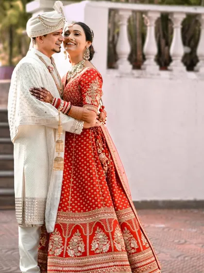 A candid wedding day photo. The bride's makeup is fresh and natural, designed to last through an emotional and happy day.