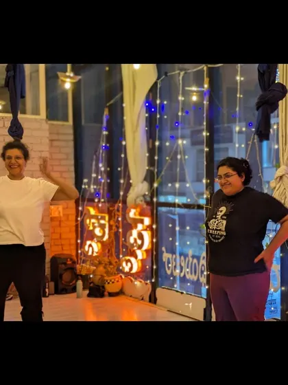 Smiles and focus in our beautifully lit studio. Our beginner classes are designed to be enjoyable and inspiring.