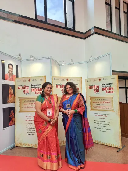 With a fellow delegate in front of the festival banners. It was three days of non-stop dance, seminars, and performances.