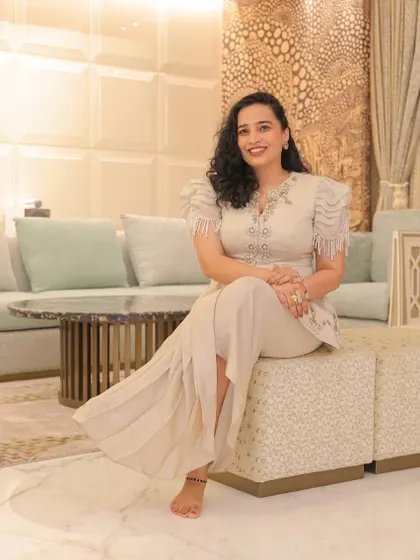 Taking a moment to pose in the beautifully designed living room of a housewarming I hosted. I always appreciate the effort that goes into creating a welcoming space.