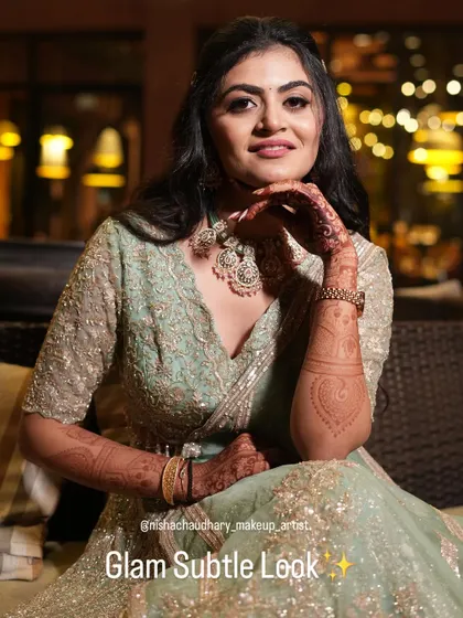 A glam and subtle look for an evening event. The makeup is polished and sophisticated, perfect for a reception or cocktail party.