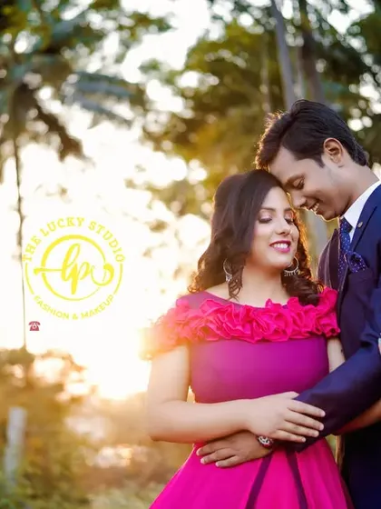 A golden hour shot capturing a tender moment. I created a soft, romantic makeup look with loose curls for her to complement the sunset and the beautiful pink gown.