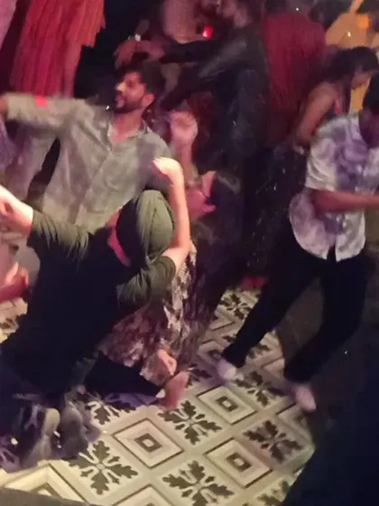 This is what a Bhangra night looks like. People letting loose on the dance floor with high-energy moves.