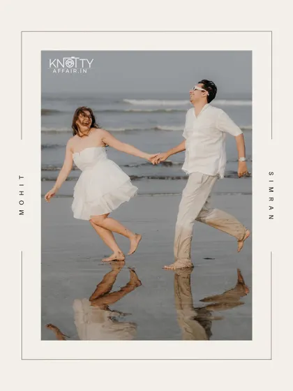 A fun, candid shot of the couple running along the water's edge, their reflections captured in the wet sand. The graphic frame adds a modern, stylish touch to this beach pre-wedding picture.