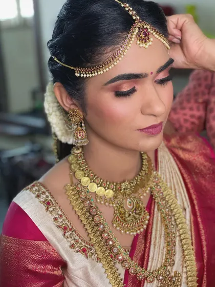 A close-up of the rose-gold eyeshadow and pink lip color I chose for this bride. This look is a perfect example of a modern take on classic bridal makeup.