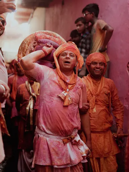 A comprehensive photo series from Lathmaar Holi in Barsana. These images document the unique tradition where women playfully hit men with sticks, recreating a legend of Lord Krishna and Radha. The photos are filled with motion, color, and raw emotion.
