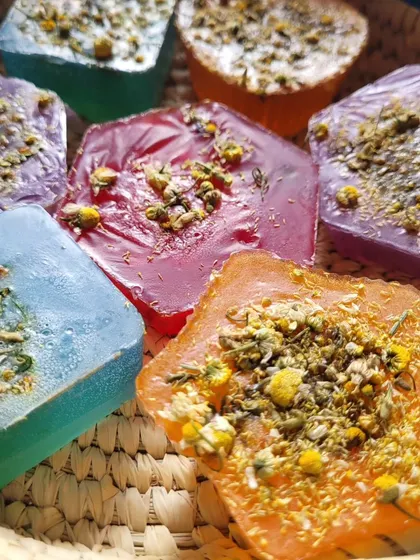 The vibrant colors and natural toppings of my handmade soaps. Each one is a small piece of art for your skin.