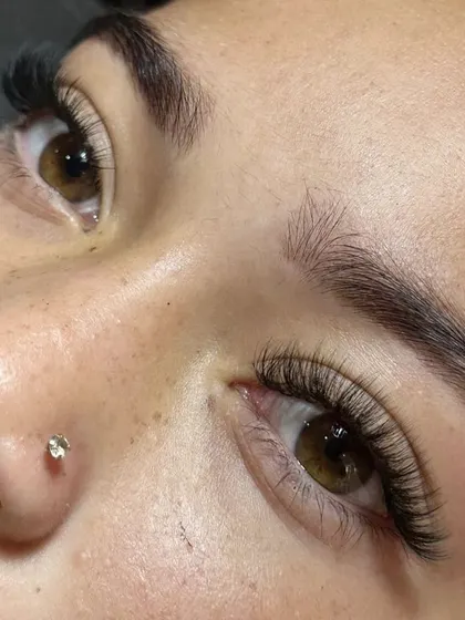 A close-up shot of a client's new lashes. The detail and precision in each lash ensures a flawless result.
