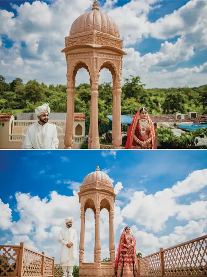 The couple stands apart under a beautiful stone gazebo, with the vast blue sky and green landscape behind them. This composition creates a feeling of epic romance.