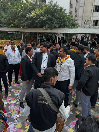 The atmosphere during the SBA elections, with dhol players and supporters. This is a demonstration of the vibrant spirit of our advocate community.