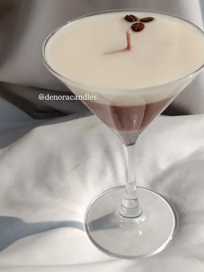 A side profile of the coffee martini glass candle, highlighting its sleek and sophisticated design.