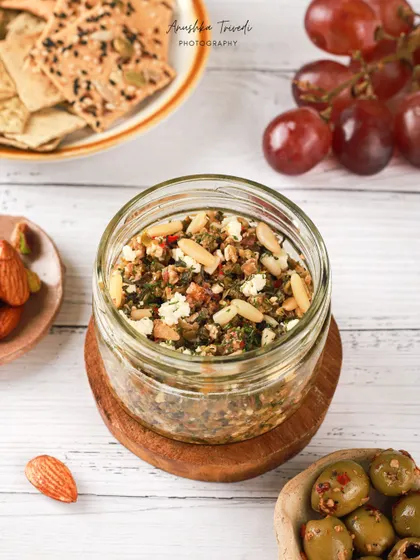 The olive tapenade shown in its packaging jar, perfect for an e-commerce product listing.