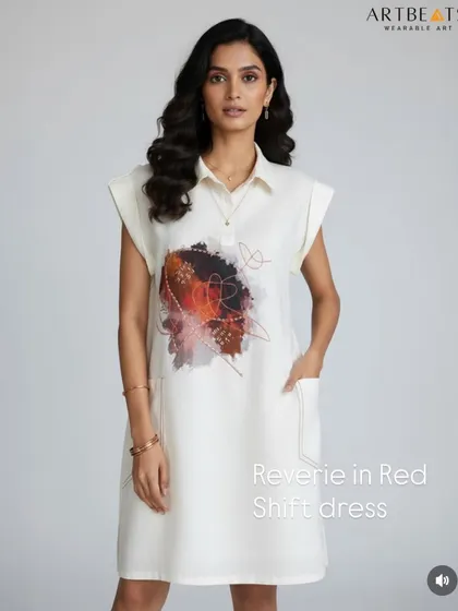A full-length view of the Reverie in Red shift dress. The relaxed silhouette and cap sleeves make it an effortlessly chic piece, while the artwork provides a focal point of color and emotion.