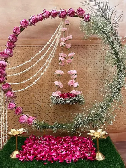 This dreamy moon-gate arch is a romantic and unique choice for Ganpati or an engagement, creating a magical, celestial vibe.