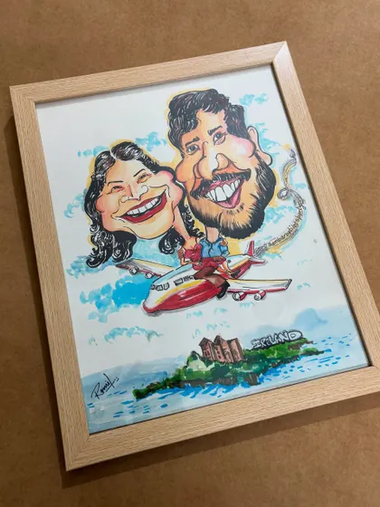 The final, framed version of the traveling couple. The light wood frame complements the bright and airy feel of the watercolor painting perfectly.
