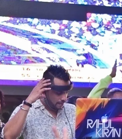 At the decks during a Dandiya Night in Bangalore. The large LED screen behind me adds a great visual element to the festive celebration.