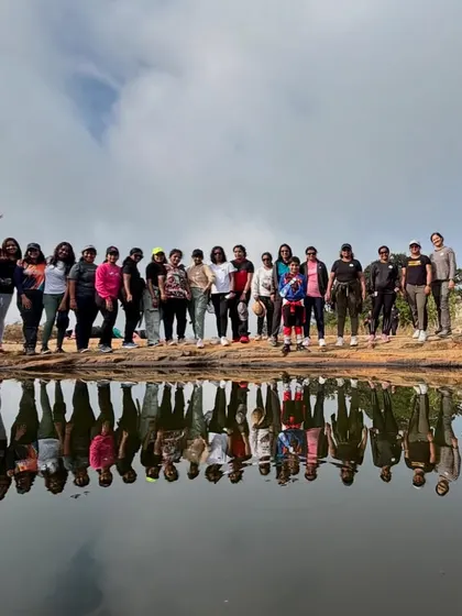 A creative group shot with a perfect reflection. We encourage teams to have fun and capture the beauty of the trail in unique ways.