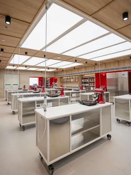 The combination of natural wood and stainless steel creates a warm yet professional atmosphere.