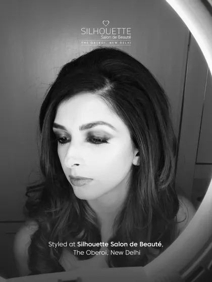 A timeless black and white shot of Aishwarya Jha after her hair and makeup session, capturing a moment of classic glamour.