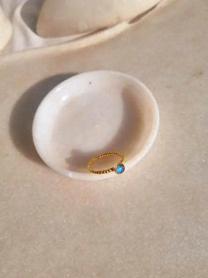 A close-up of the Labradorite Venus Ring.